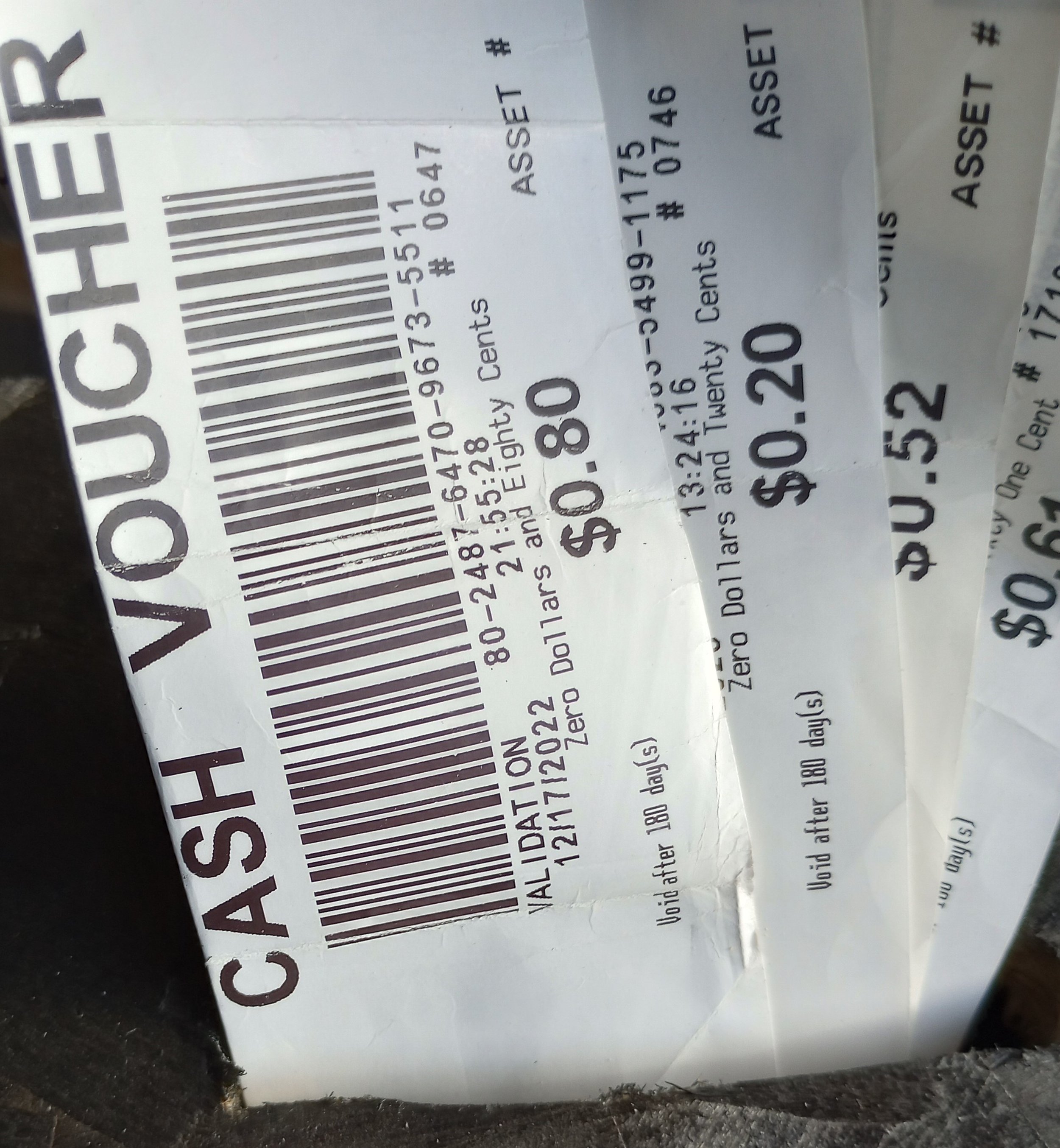 A donated casino voucher headed for the collection box
